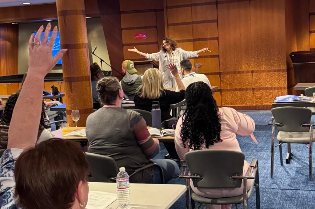 Dorice Horenstein, leadership keynote speaker, engaging an audience during a live presentation.